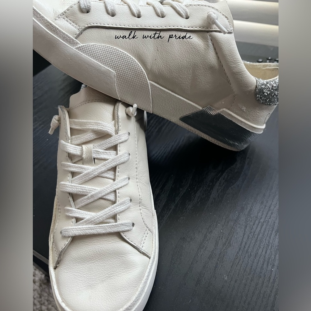Stylish White Sneakers with Silver Accents by dolce vita walk w pride rainbow